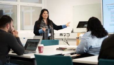 Students in class listening to lecturer