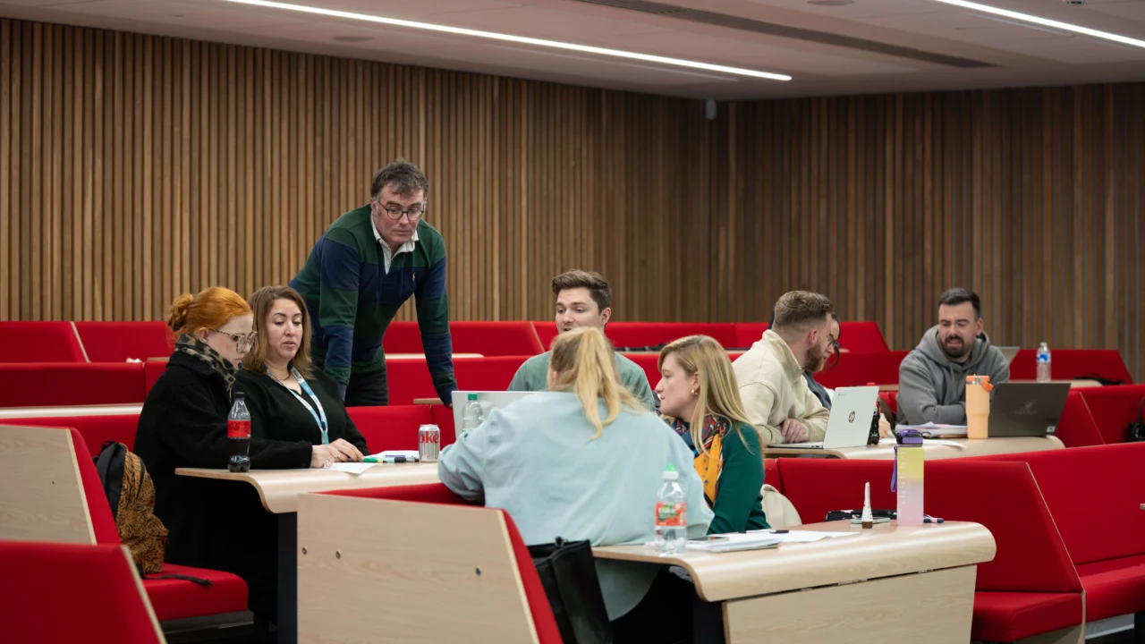 Education, Childhood and Professional Studies students in lecture theatre with academic