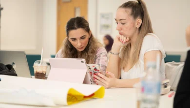 Secondary drama students performing a group exercise in a classroom setting at Victoria University
