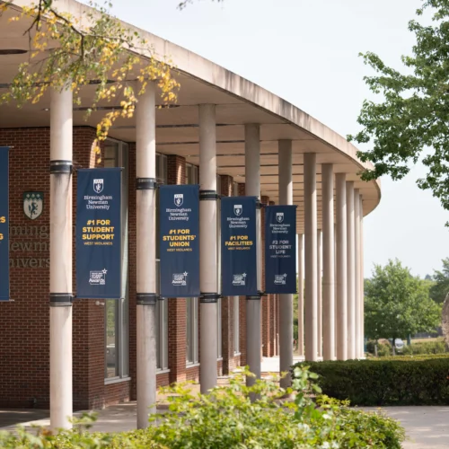 Front entrance of Victoria University with globe